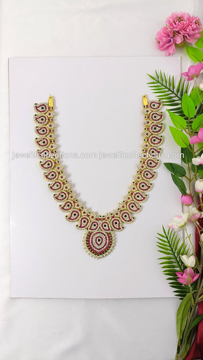 Long patterned curved Amman necklace